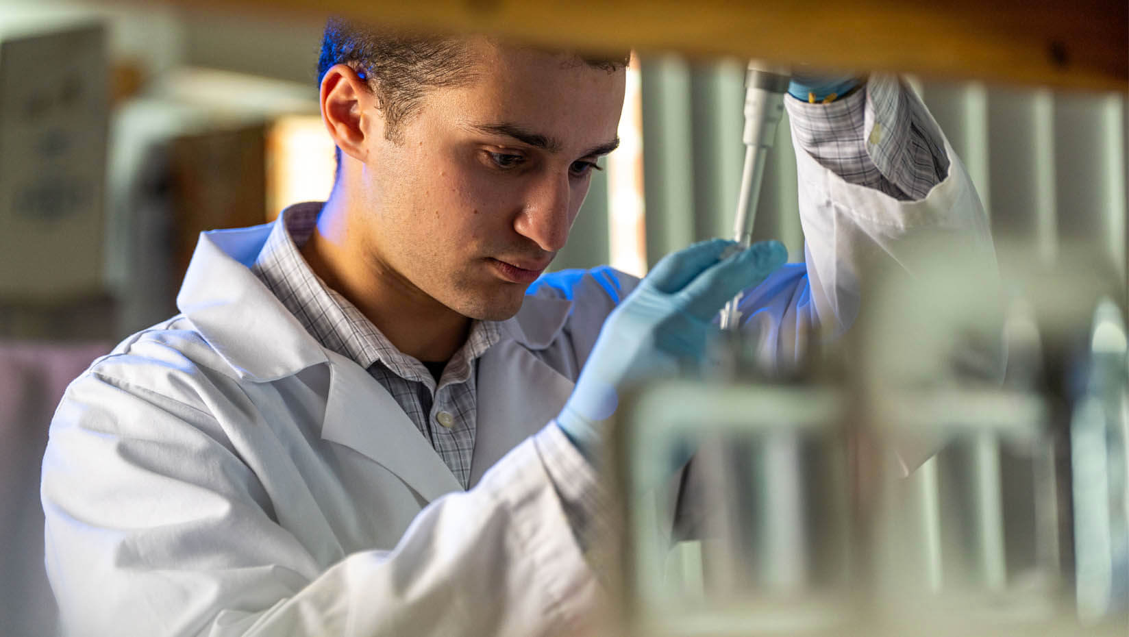 A photo of a student working in a research lab