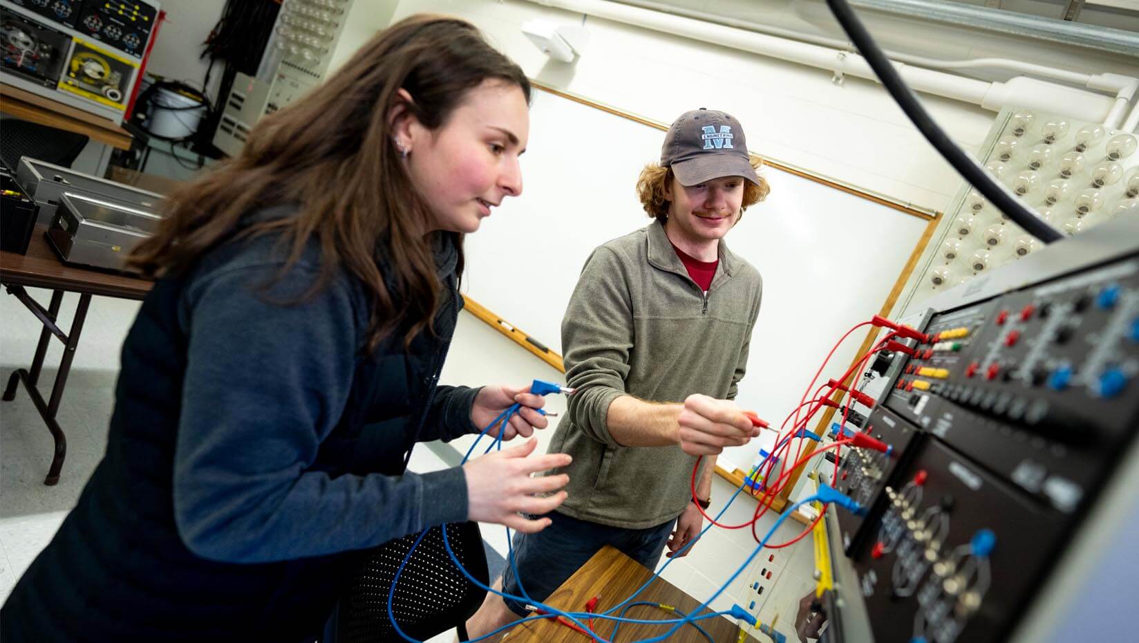 A photo of two people working in a lab