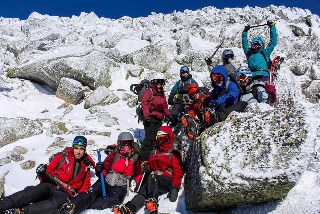 A photo of people hiking in the winter