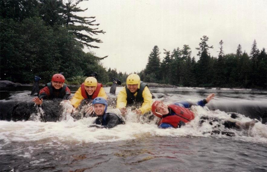 A photo of people on white water rafting