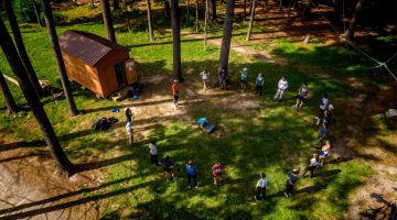 An aerial photo of people participating in a Maine Bound program