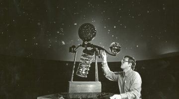 A photo of an astronomer with equipment