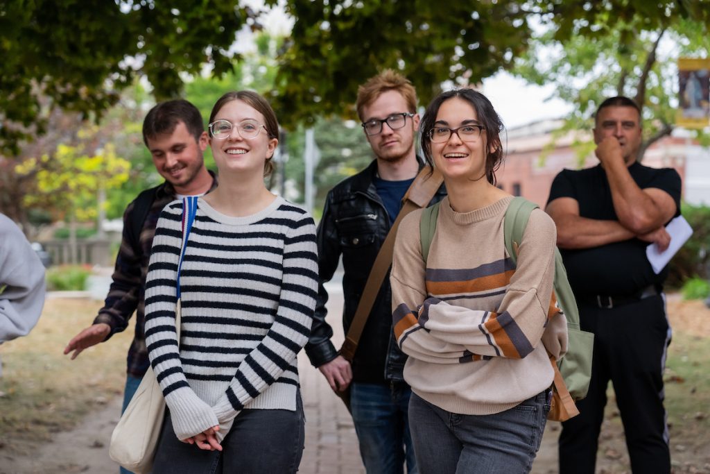 A photo of students walking downtown