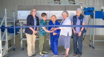 A photo of Gov. Janet Mills, Joan Ferrini-Mundy and others at a ribbon cutting