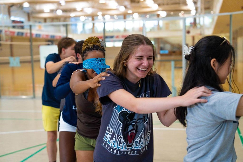A photo of high school students participating in group activities.