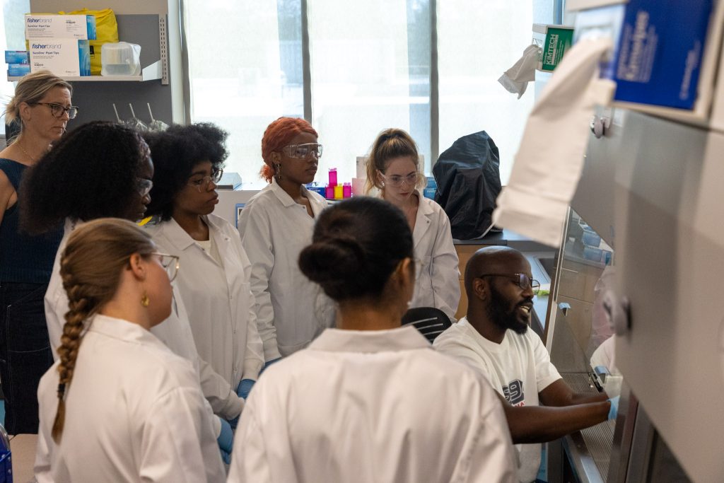 A group of students working in a lab