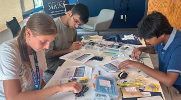 An image of students working on semiconductor chip design