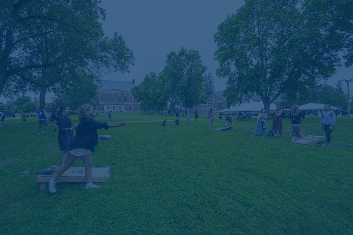 A photo of prospective students playing lawn games with a blue overlay. Link to Student Accessibility Services