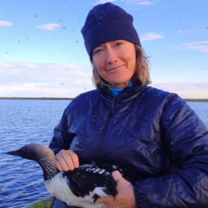 Carrie Gray holds a loon