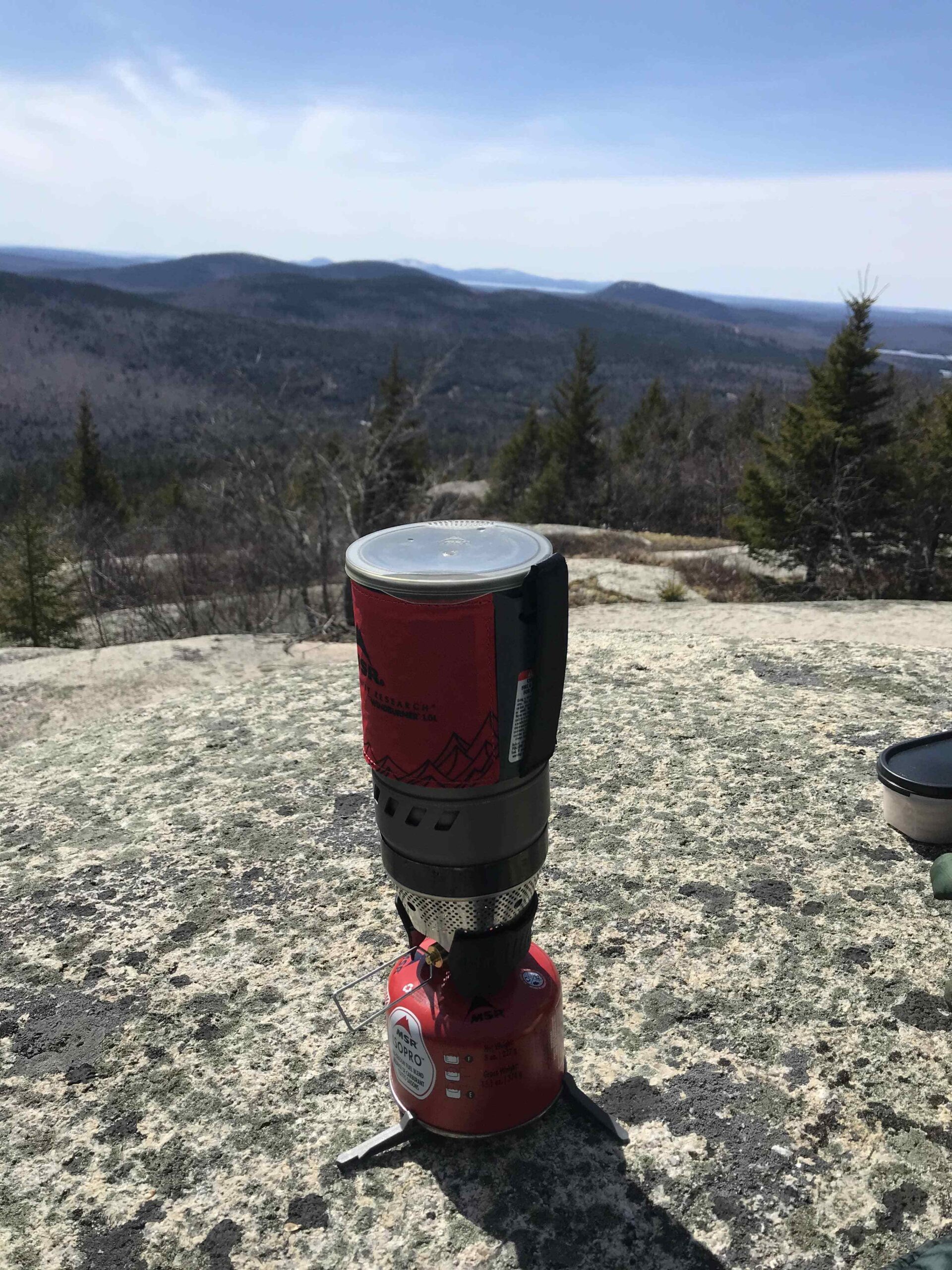 Backpacking stove being used.