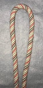 A folded piece of rope with no dead spot showing that it is sturdy.