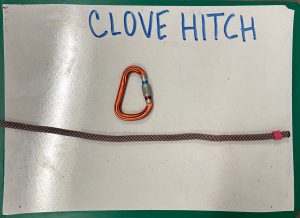 carabiner and rope below the words 'clove hitch'