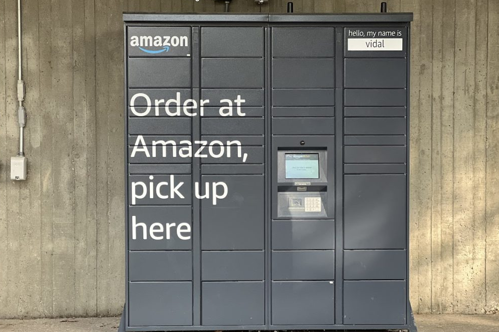 A dark gray Amazon Locker named "vidal" with text "Order at Amazon, pick up here."