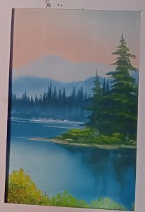 A painting of a lake at dawn with mountains in the background. Pine trees rest on an island slightly offshore.