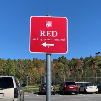 Red parking permit sign
