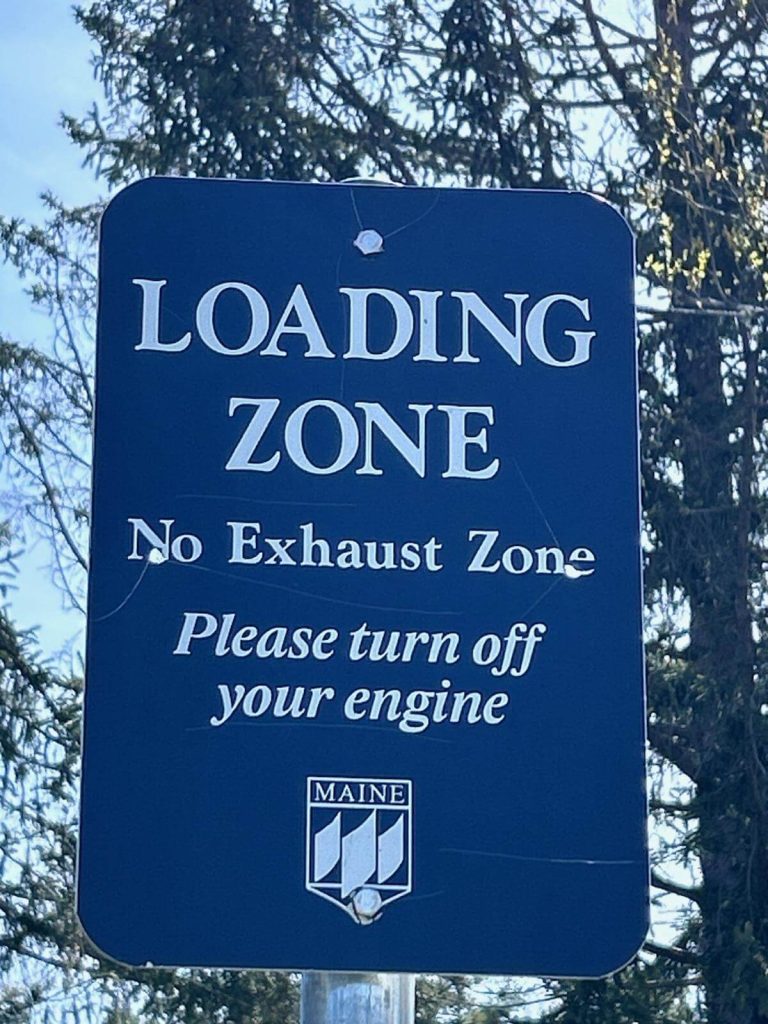 Loading zone sign