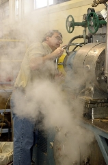 Keith Hodgins engulfed in steam in the pilot plant