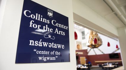 A photo of the sign inside the Collins Center for the Arts