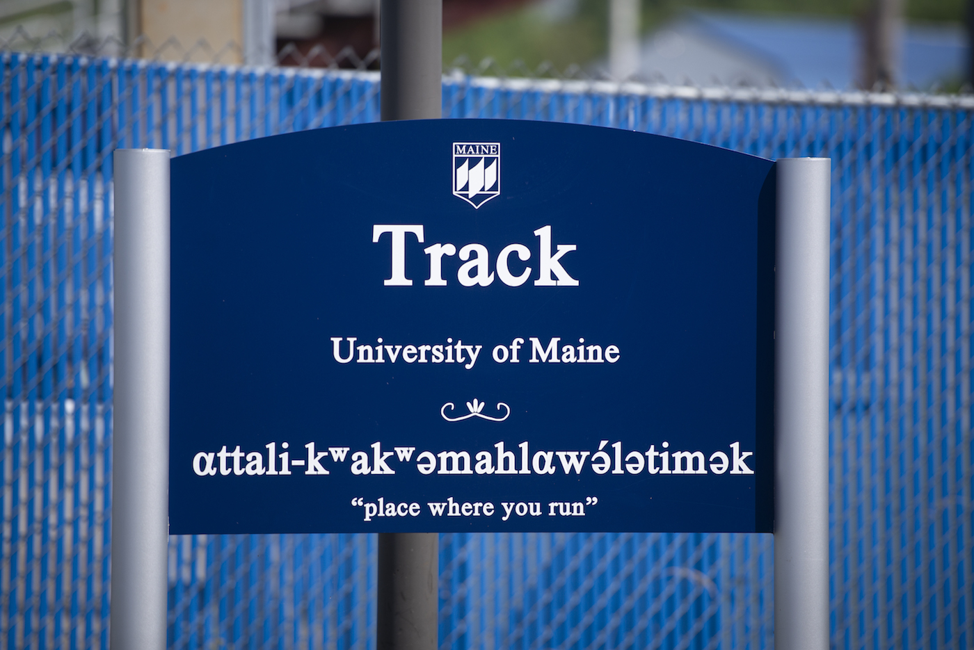 A photo of the sign at the University of Maine track