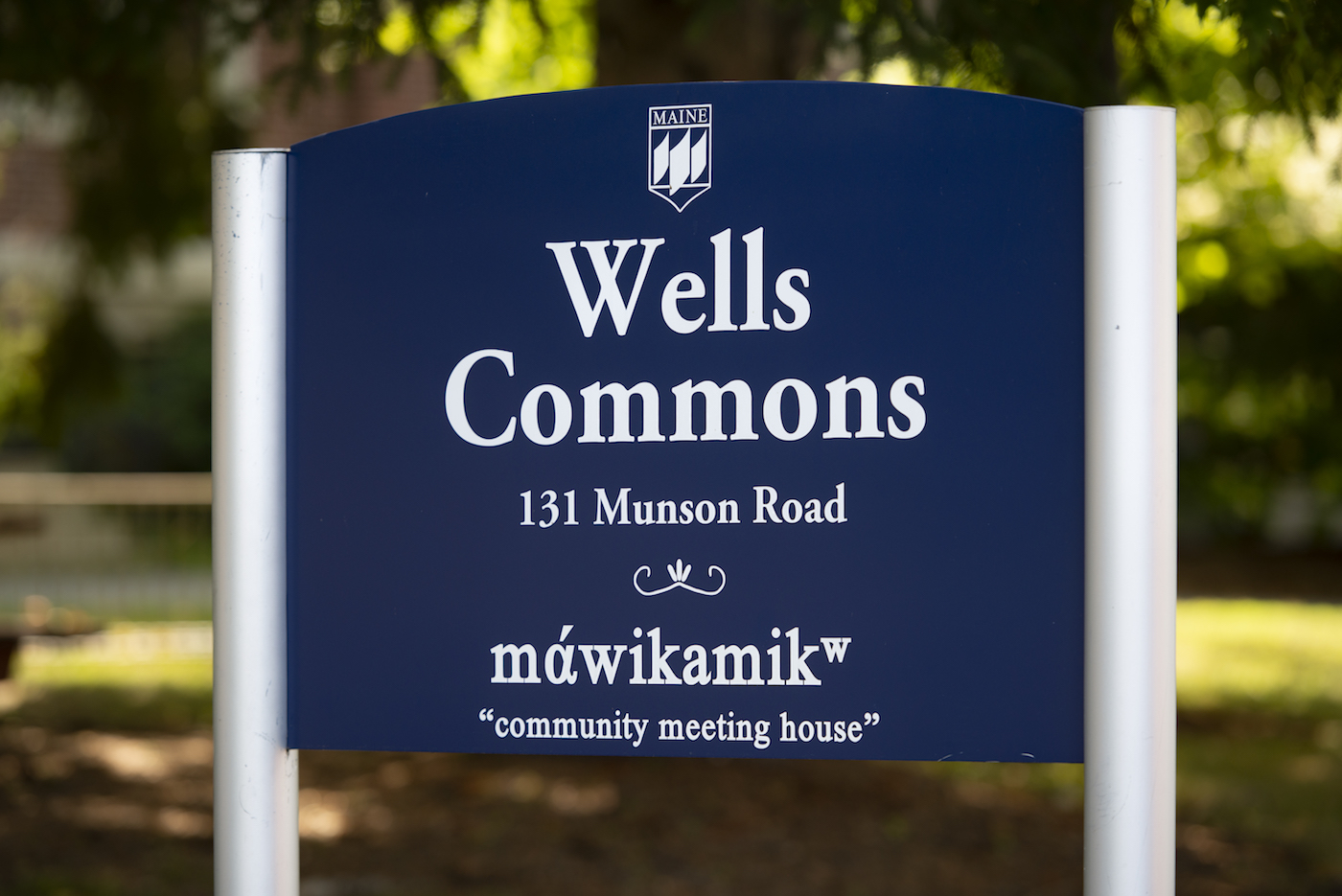 A photo of the Wells Commons signs