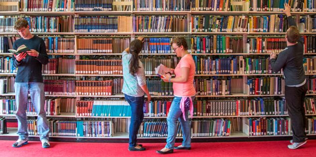 students in library