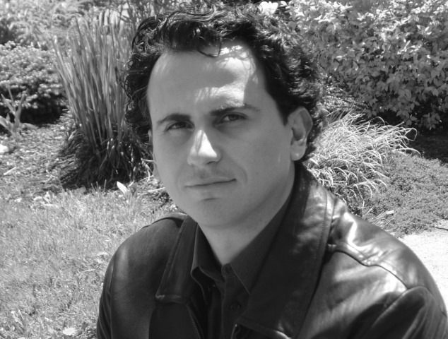 Black and white headshot of Dimitri Anastasopoulos outside