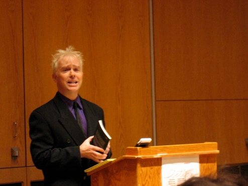 Jonah Winter engaging with the audience from behind a podium