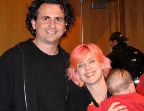 Christina Milletti and Dimitri Anastasopoulos holding their baby Zazie