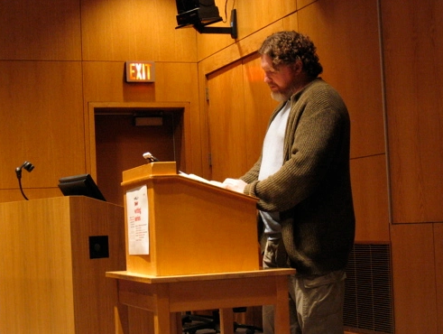 Brian Evenson reading behind a podium