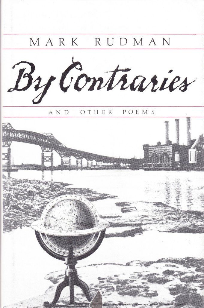 black and white photo of a globe in front of a river with a town and bridge in the background