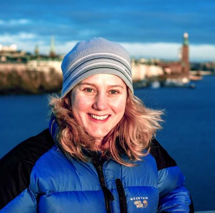 Cindy Isenhour in front of lighthouse