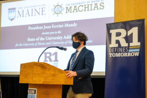 Zachary Wyles at the podium of the 2022 State of the University address