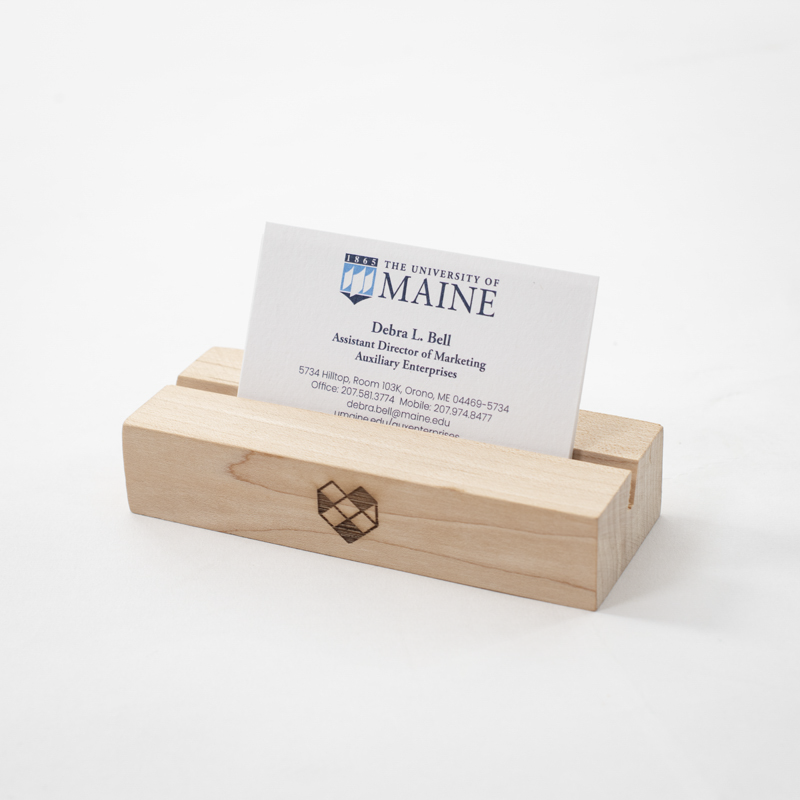 UMaine business cards on stand