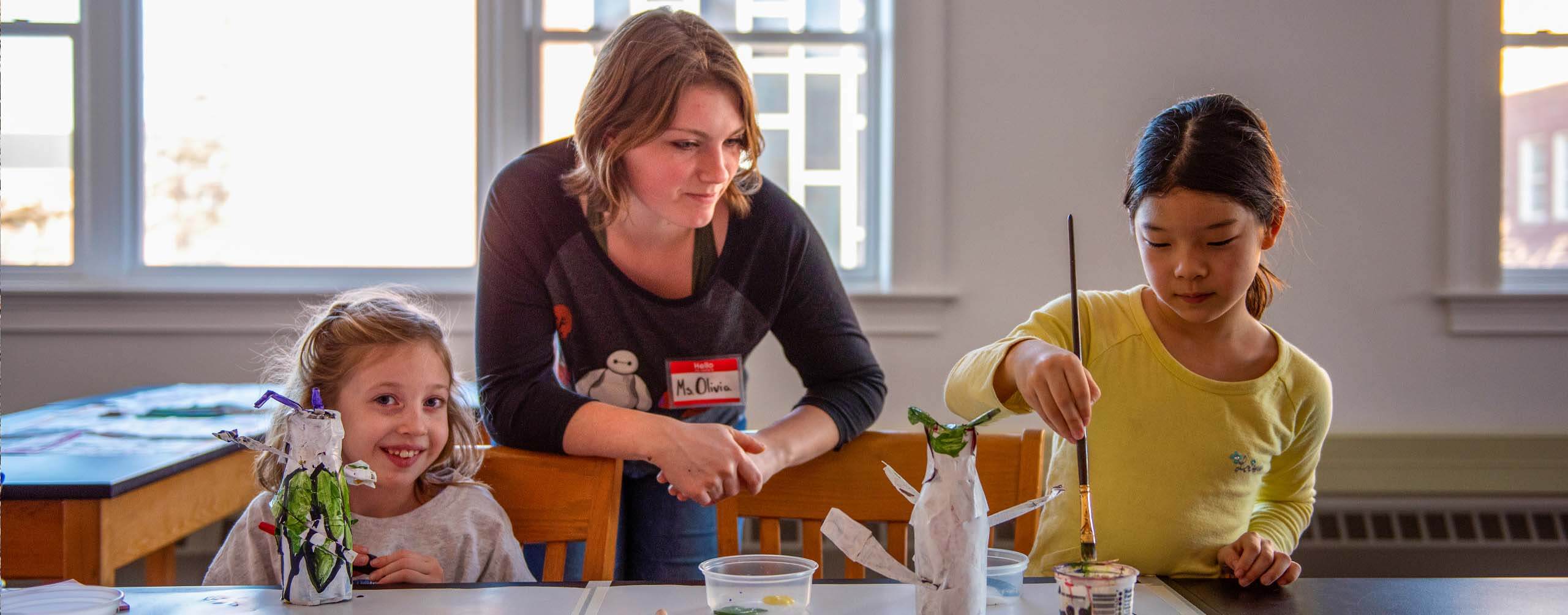 A photo of a woman with two children