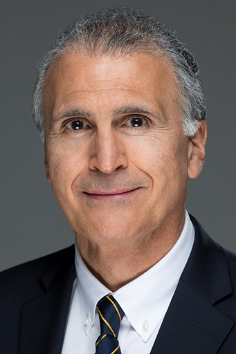 Portrait of Kody Varahramyan smiling.