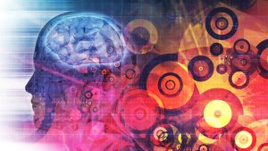 image of a head with gears floating around