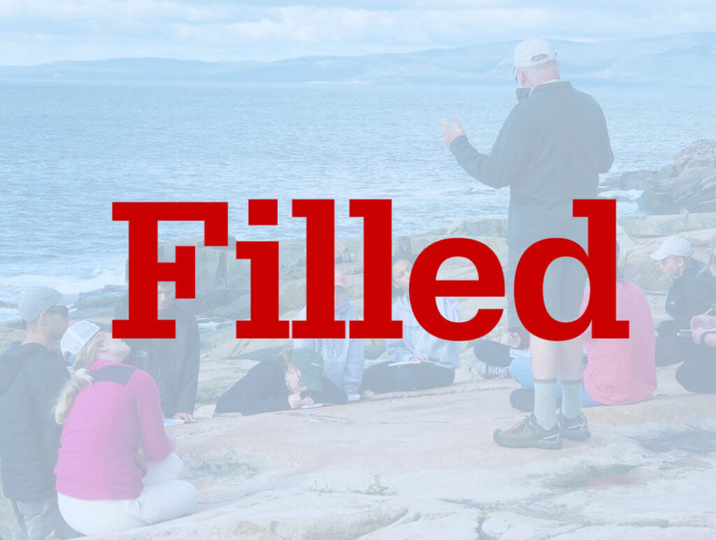 A professor teaches students on Maine's coast