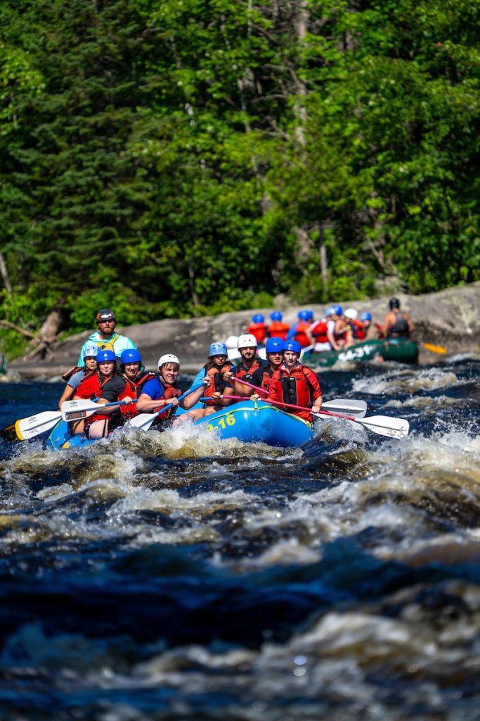 A photo of students white water rafting