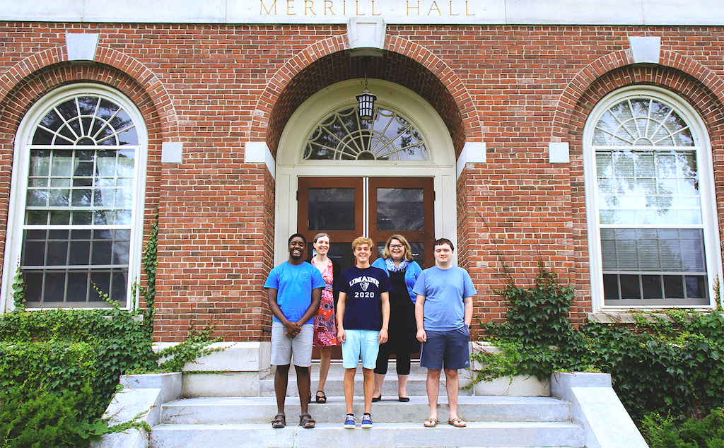 IURC team outside Merrill Hall