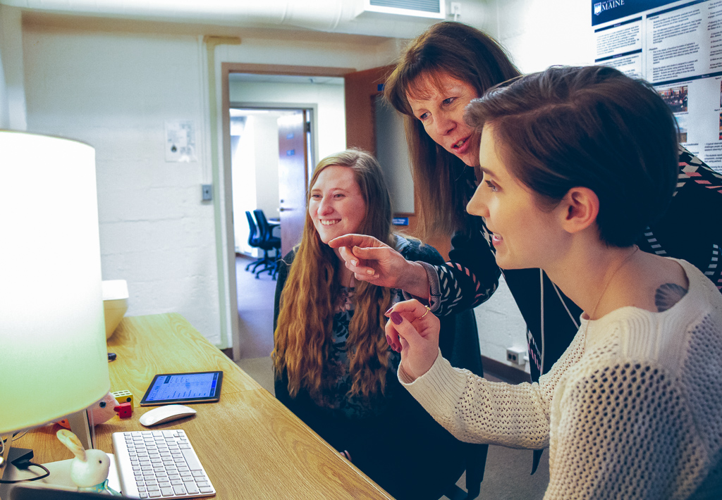 Judy walker and students in lab