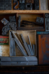 Photo of monotype ornaments sitting in a type drawer