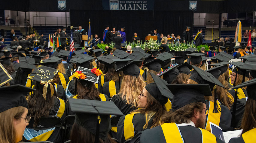 Graduate students at commencement