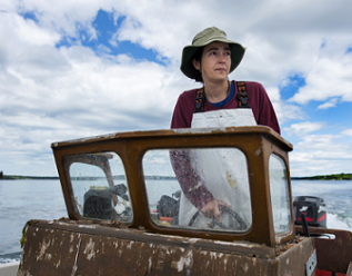 Photo of S. Redmond operating a research vessel