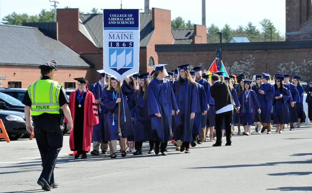 Image of CLAS graduating class walking
