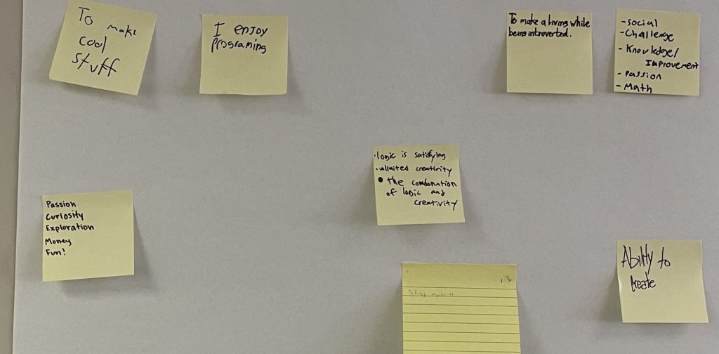 CCG - My Why for Choosing Computer Science, sticky notes on a wall stating positive reasons for CS.