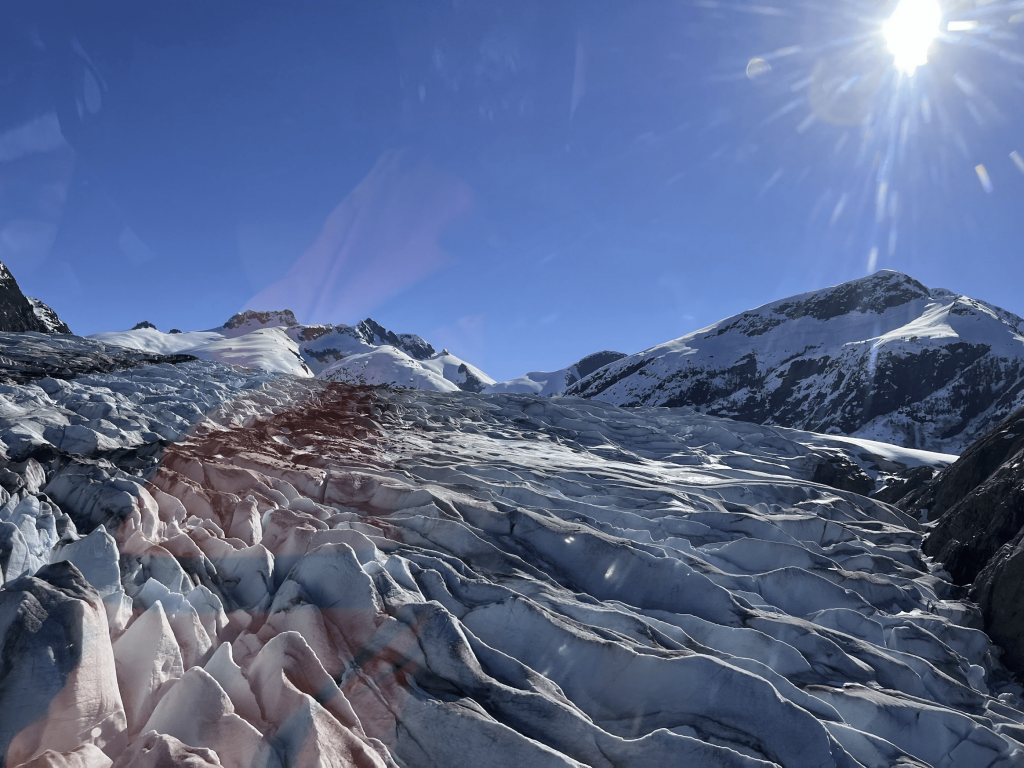 Snowy and rocky ripples of Herbert Glacier.