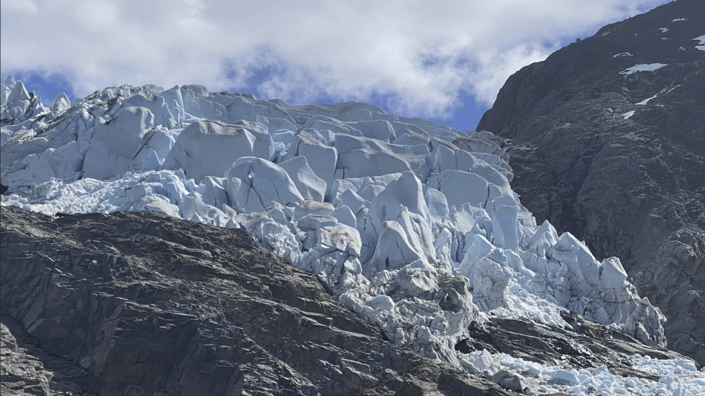 Shot of ice crumbling off of Herbert Glacier.