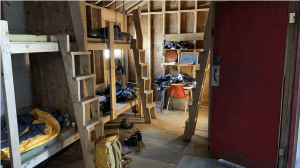 A photo of the bunk house with 4 beds at the JIRP Camp 17 Station.