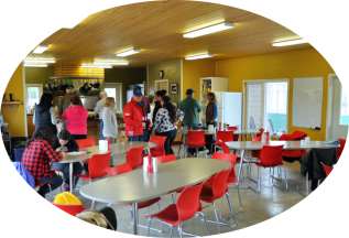 A photo of people in the dining hall of the Kluane Lake Research Station.