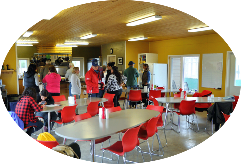 A photo of people in the dining hall of the Kluane Lake Research Station.